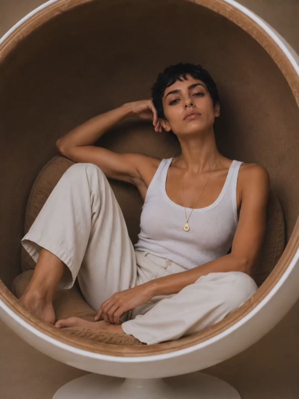 Kacee wears the stunning North Star Polaris pendant necklace in 18k yellow gold with chain