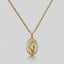 Close up DVNCI Virgin Mary pink pearl pendant necklace worn on model neck detail