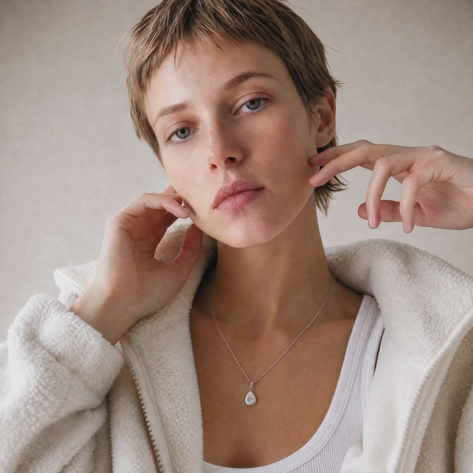 Kaaia is wearing our stunning Polaris North Star pendant in 18k white gold