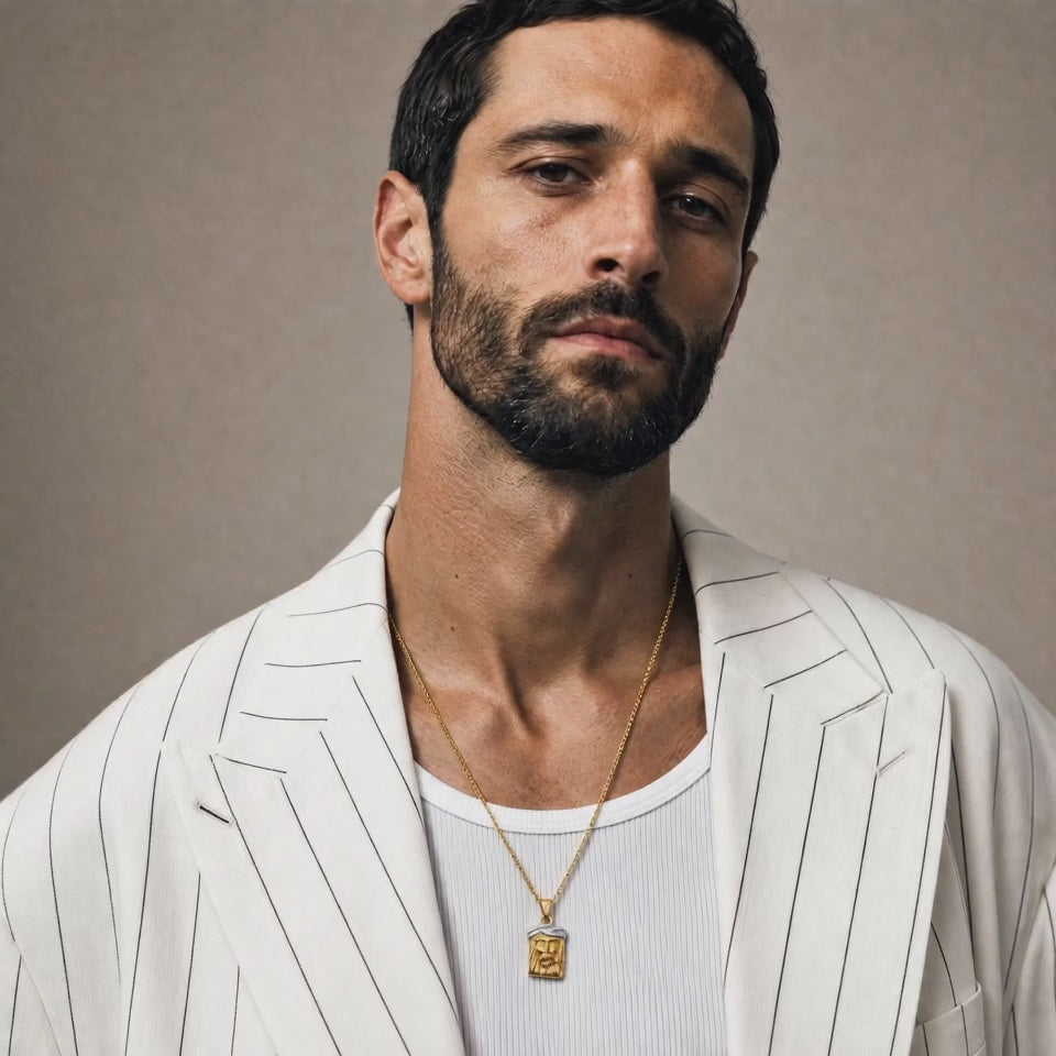 Wearing the Jesus crown pendant in 18k yellow gold with crown in 18k white gold