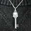 Stylish white gold skull key pendant with moissanite detail